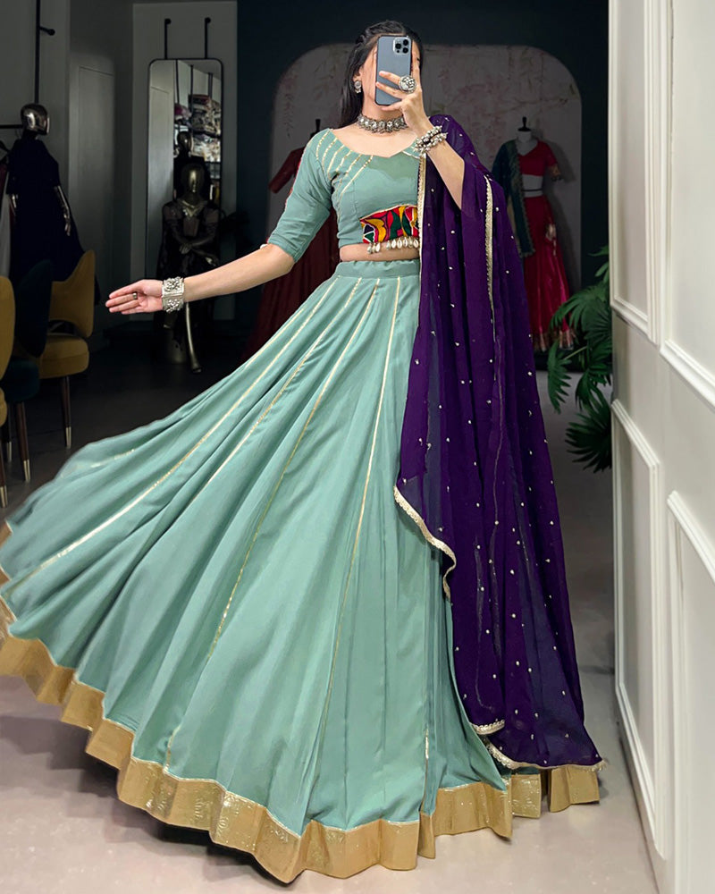 Sea Green Color Rayon Embossed Navratri Lehenga Choli - ETHNICDEAL