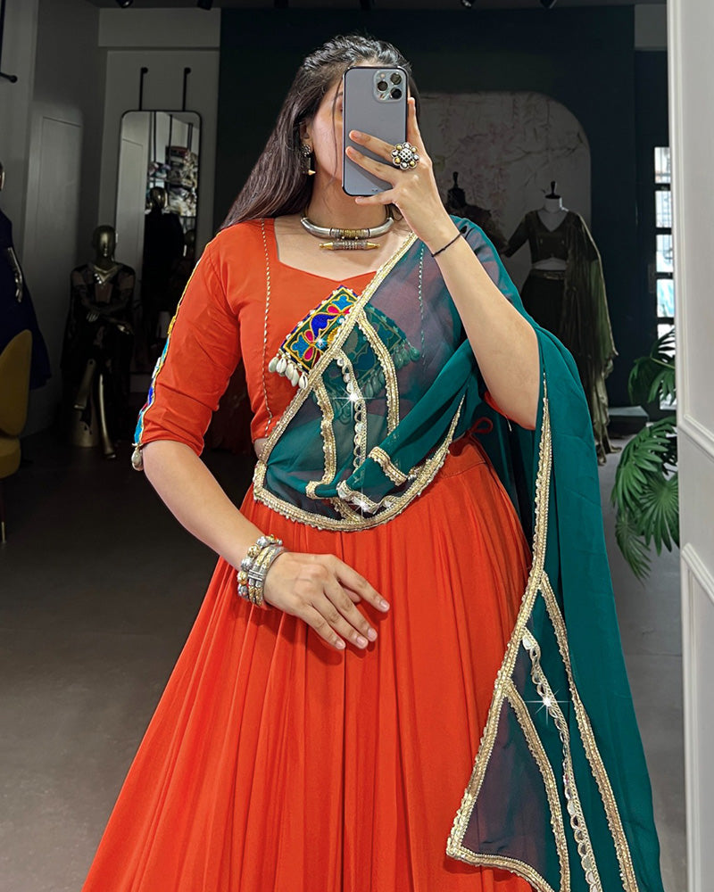Orange Color Rayon Embossed Navratri Lehenga Choli - ETHNICDEAL