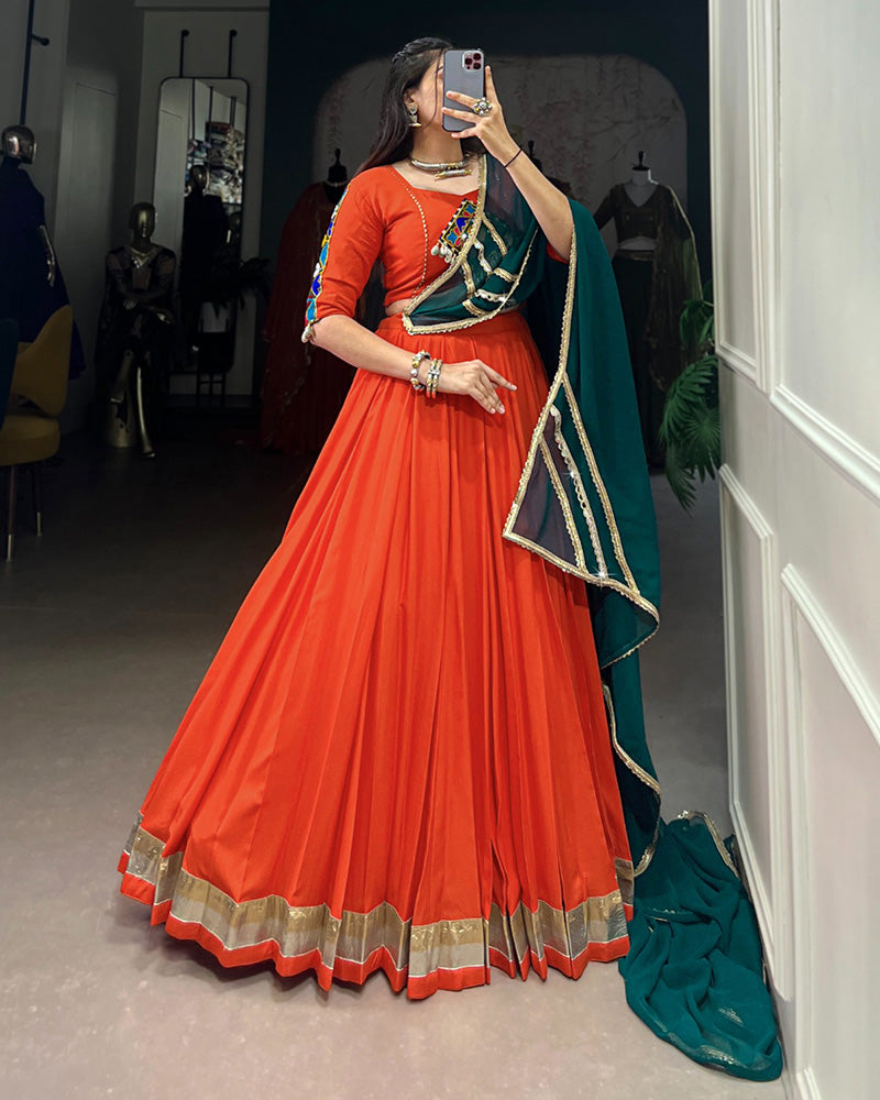 Orange Color Rayon Embossed Navratri Lehenga Choli - ETHNICDEAL