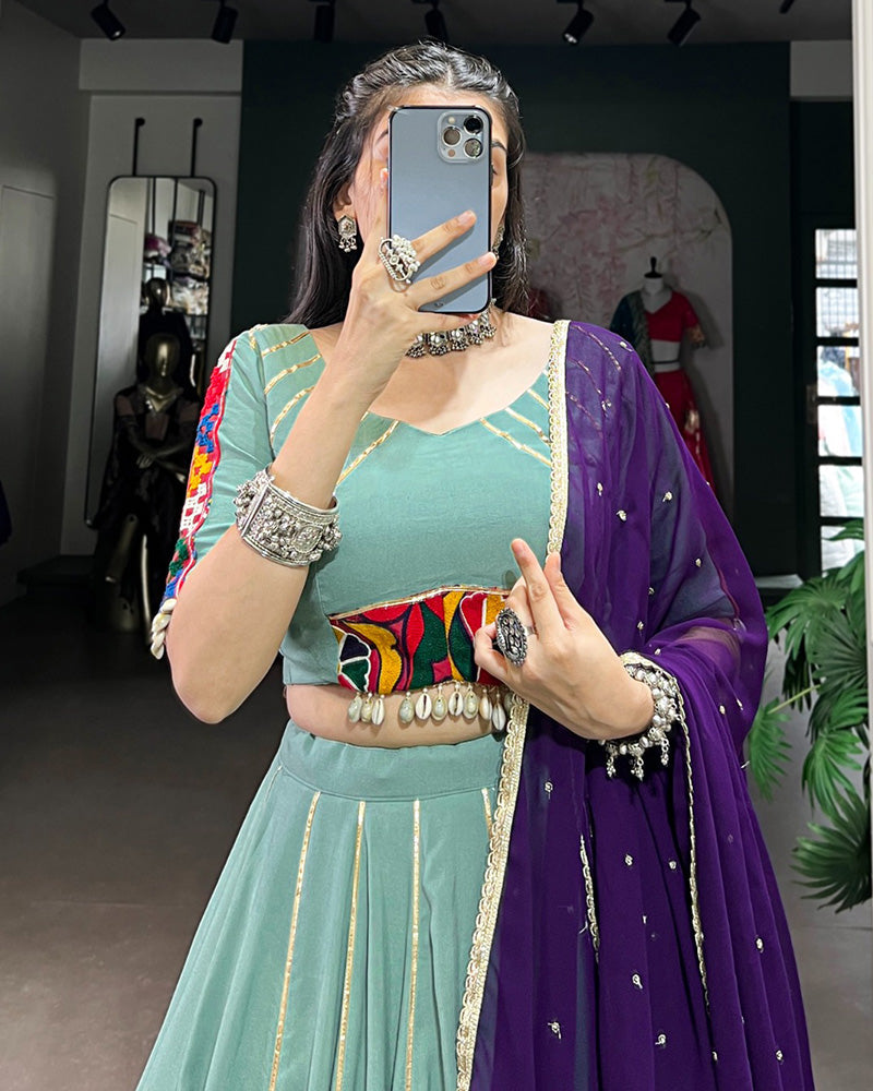 Sea Green Color Rayon Embossed Navratri Lehenga Choli - ETHNICDEAL