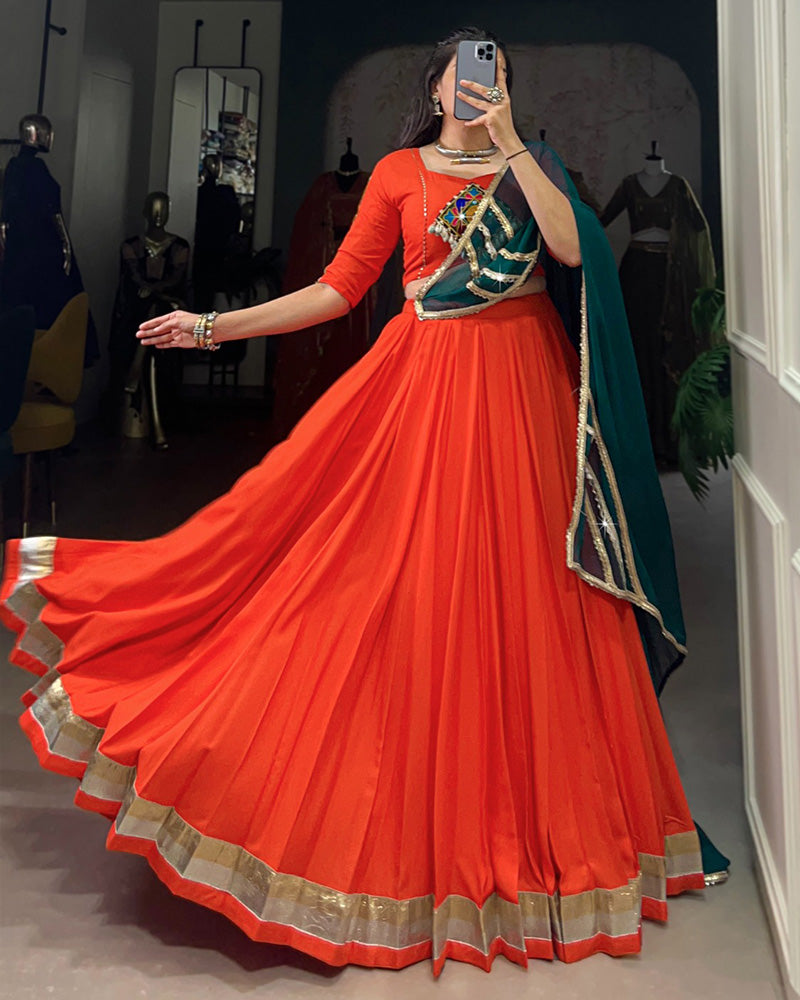 Orange Color Rayon Embossed Navratri Lehenga Choli - ETHNICDEAL