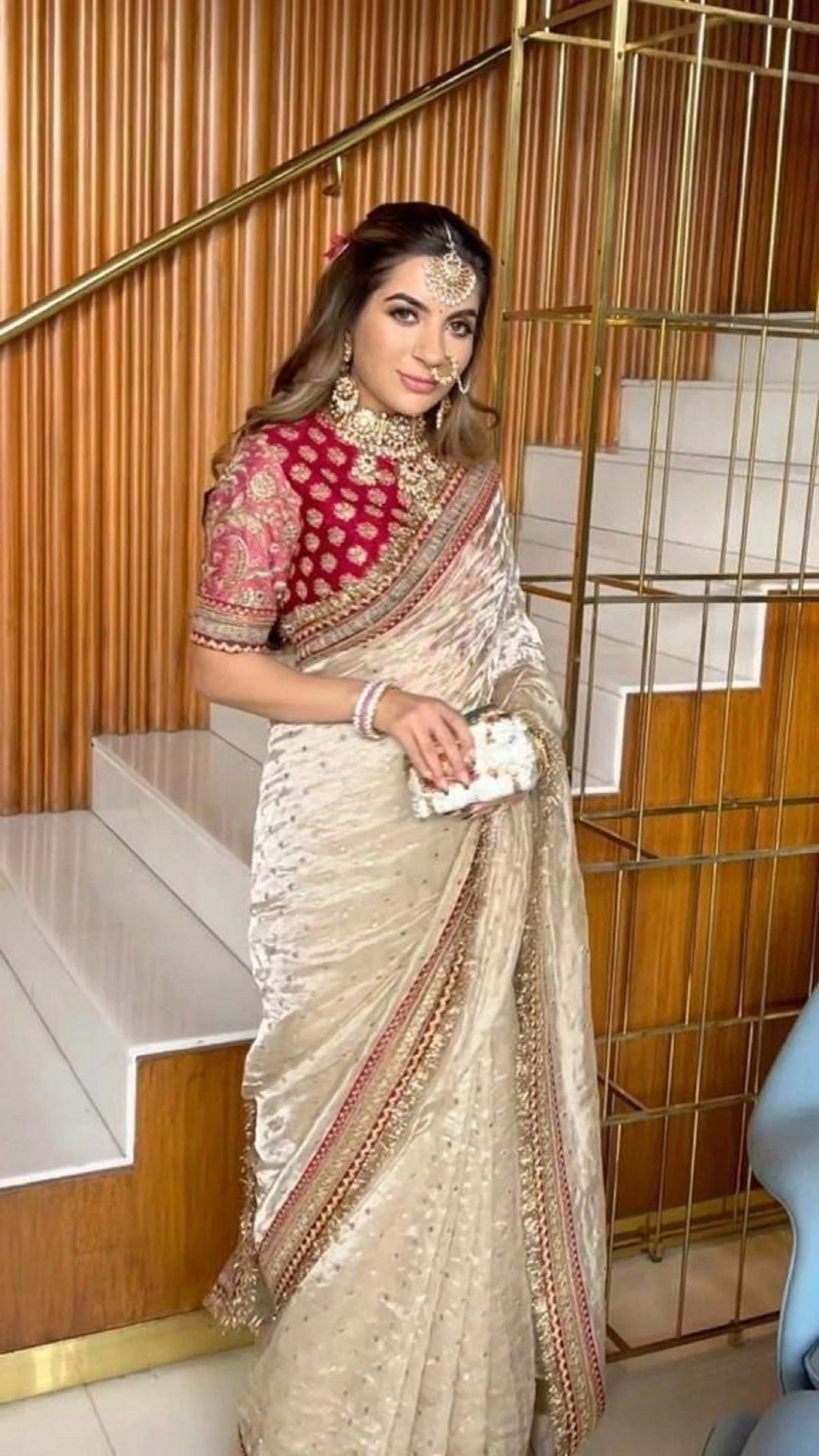 Elegant Beige Jimmy Choo Saree With Intricate Sequin Embellishments