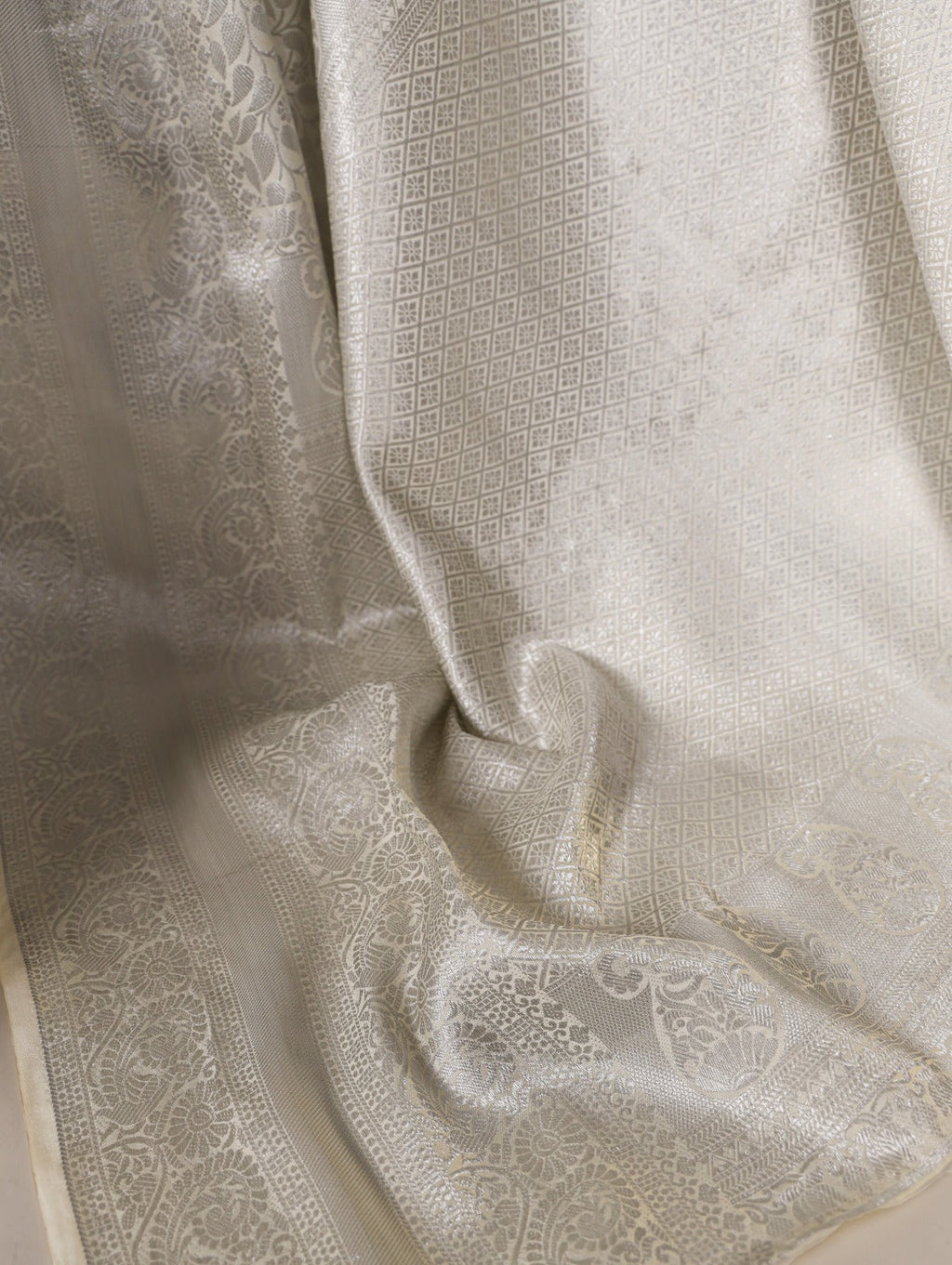 Exquisite Off White Kanjivaram Silk Zari Weaving Worked Saree - Ethnicwish