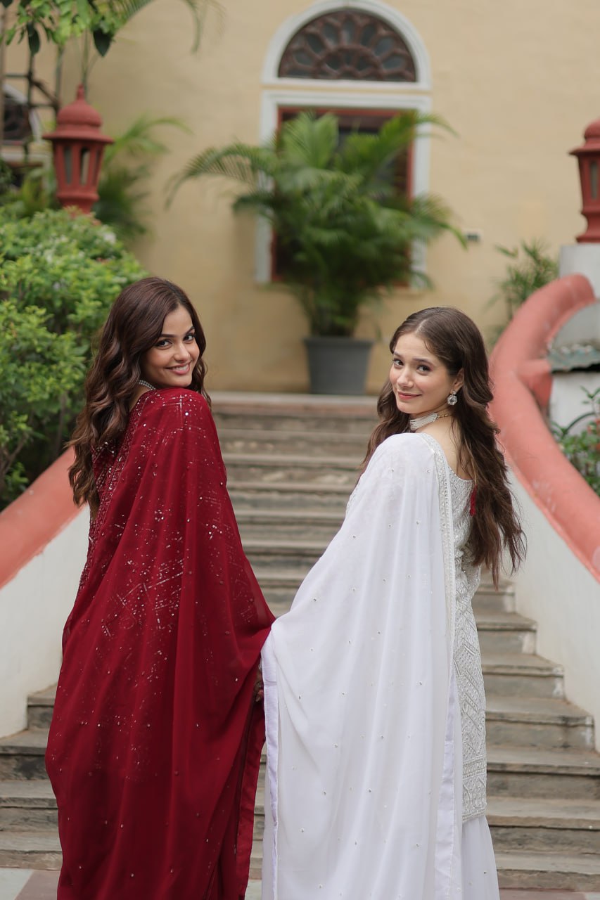 Mesmerizing Faux Georgette Sequins Thread Worked Top Sharara Suit - Ethnicwish