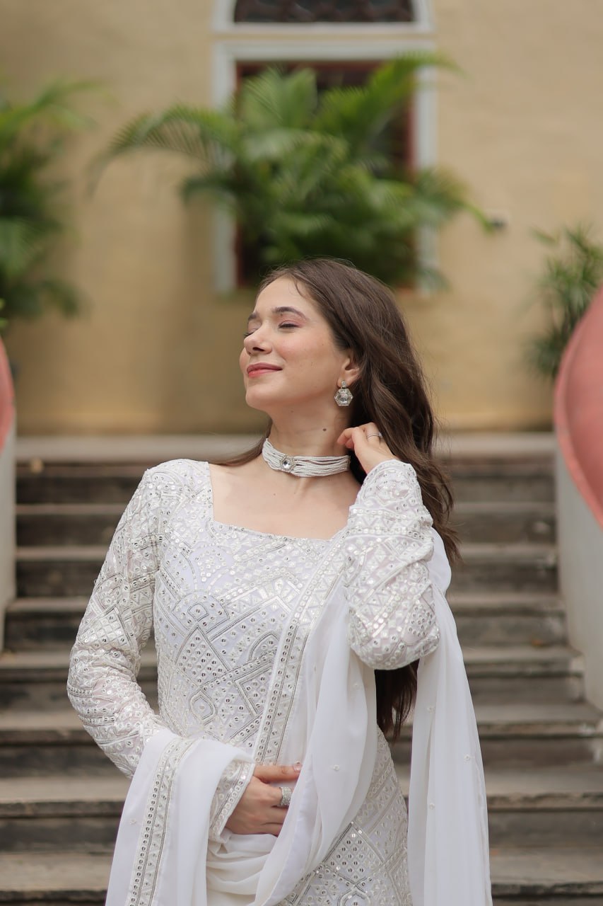 Mesmerizing Faux Georgette Sequins Thread Worked Top Sharara Suit - Ethnicwish