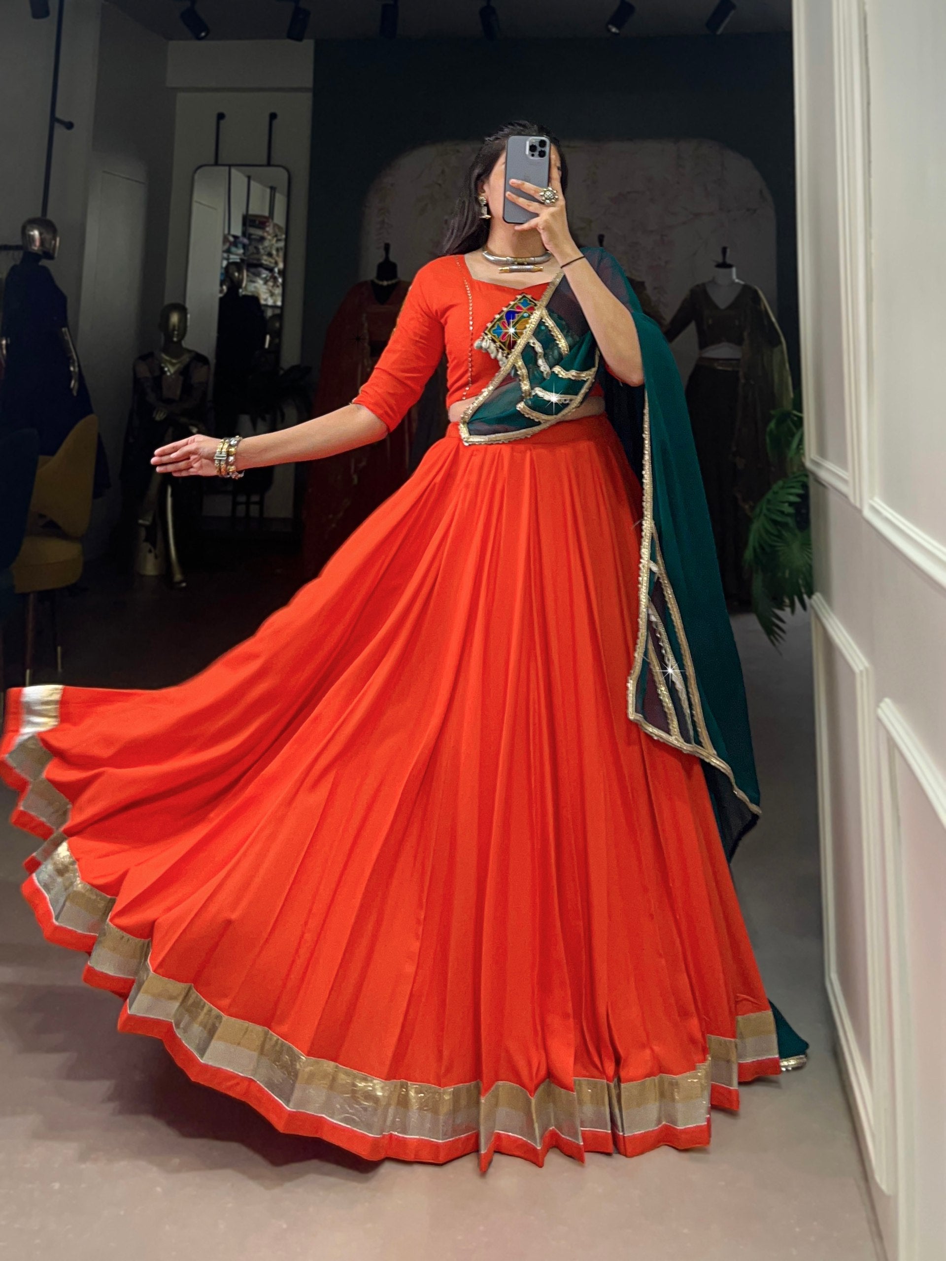 Magnificent Orange Pure Rayon Embossed Navratri Lehenga Choli - ETHNICDEAL