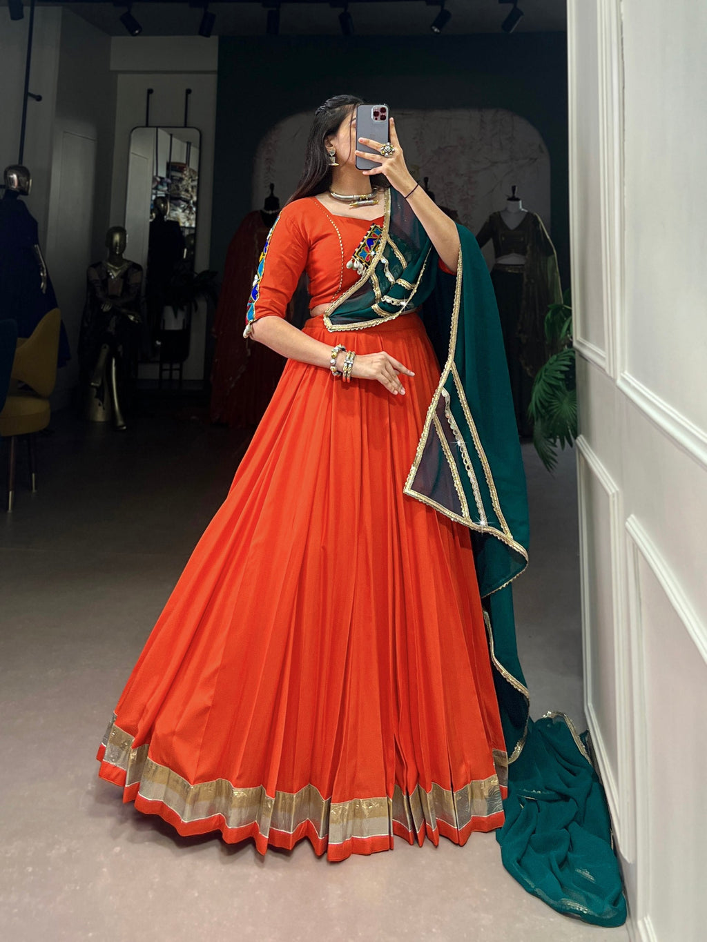 Magnificent Orange Pure Rayon Embossed Navratri Lehenga Choli - ETHNICDEAL