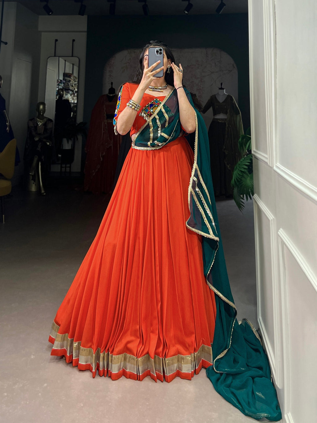 Magnificent Orange Pure Rayon Embossed Navratri Lehenga Choli - ETHNICDEAL